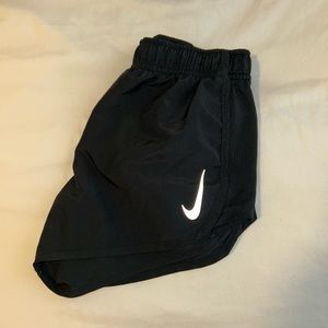 Black Nike running shorts
